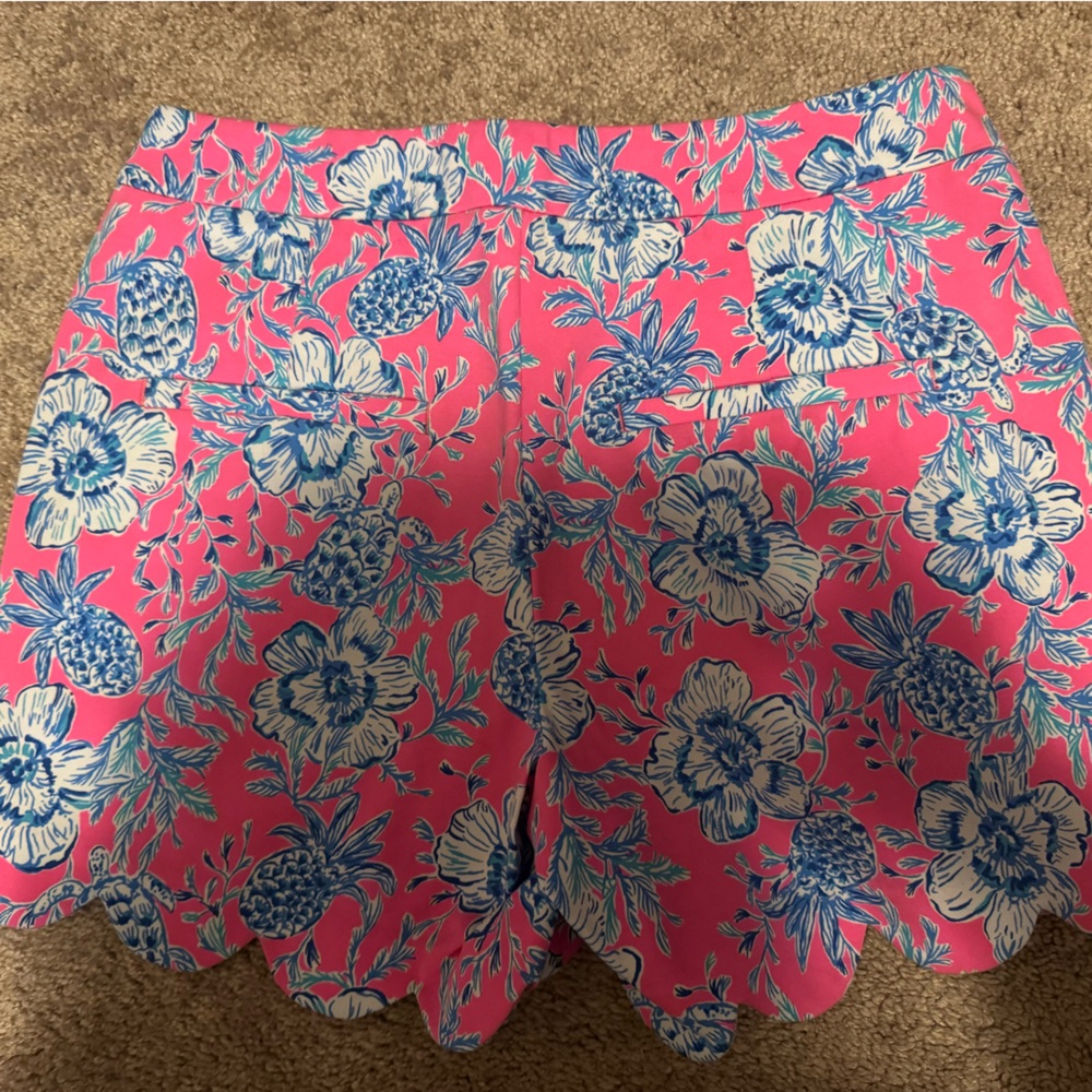 LILLY PULITZER PINK AND BLUE FLORAL PINEAPPLE SHORTS WITH GOLD BUTTON - Picture 2 of 4
